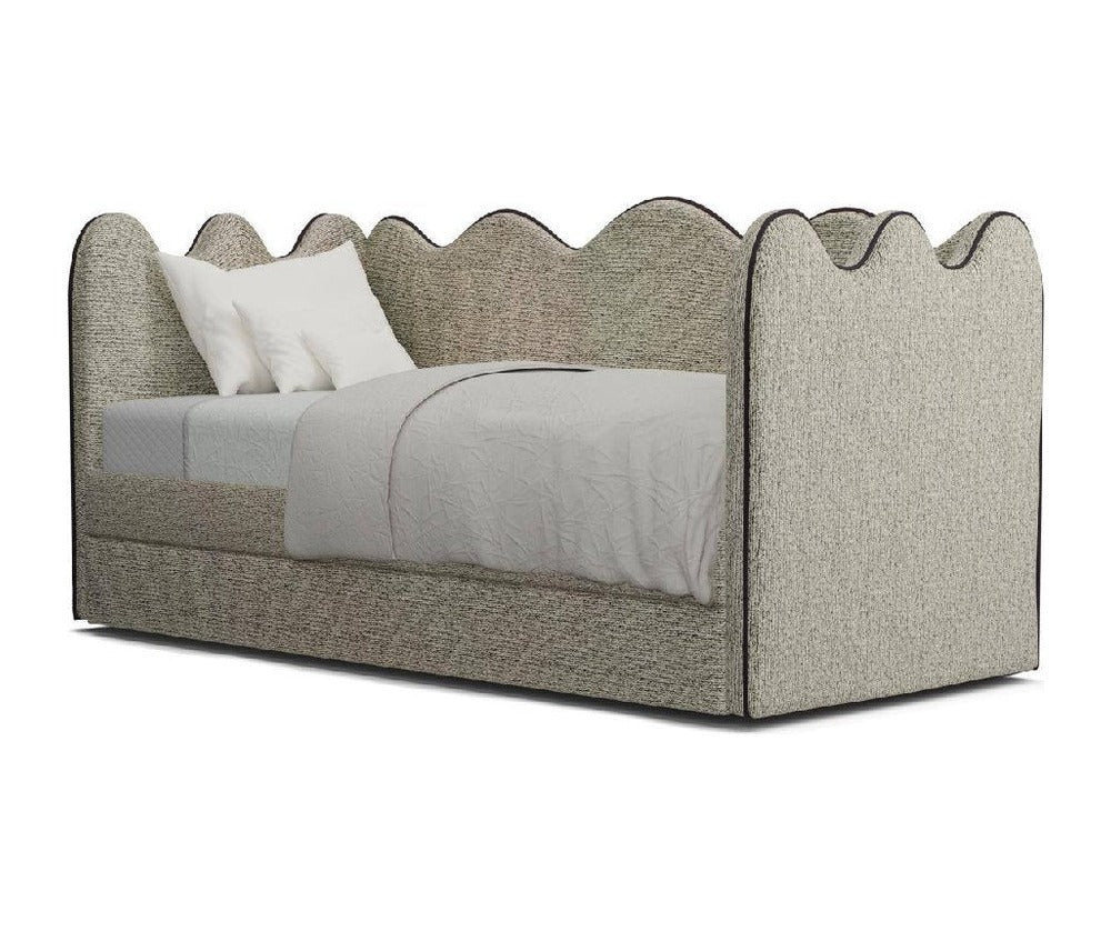Adelina daybed with scalloped backrest, angled view